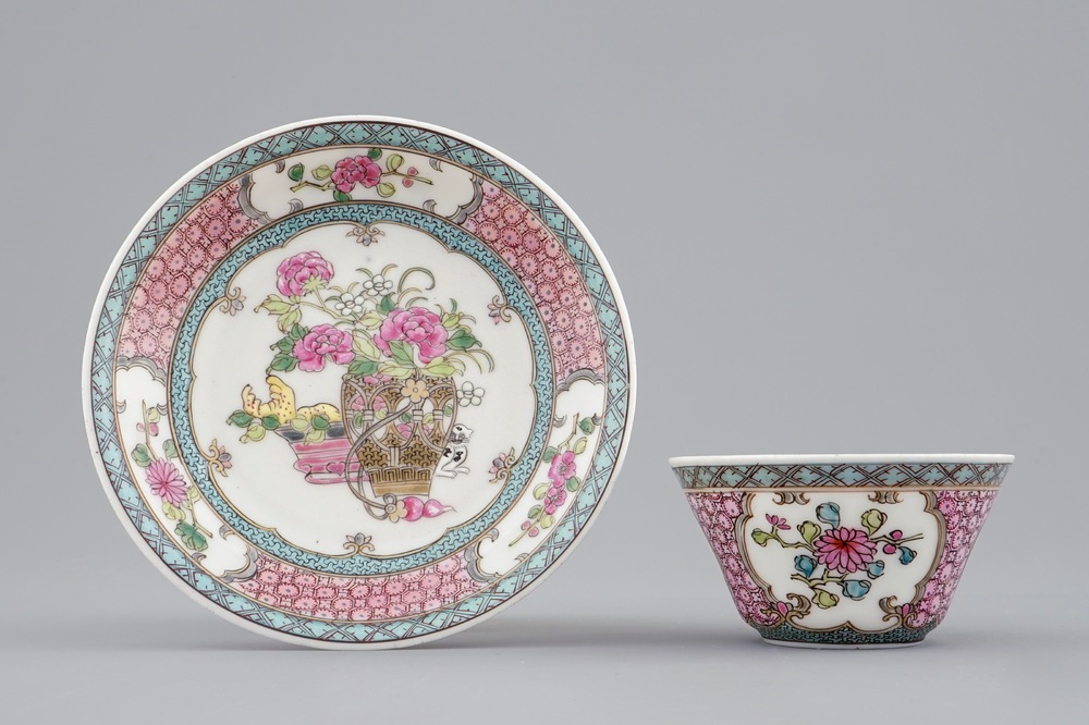 A Chinese famille rose eggshell cup and saucer with a cat near a flowervase, Yongzheng, 1723-1735