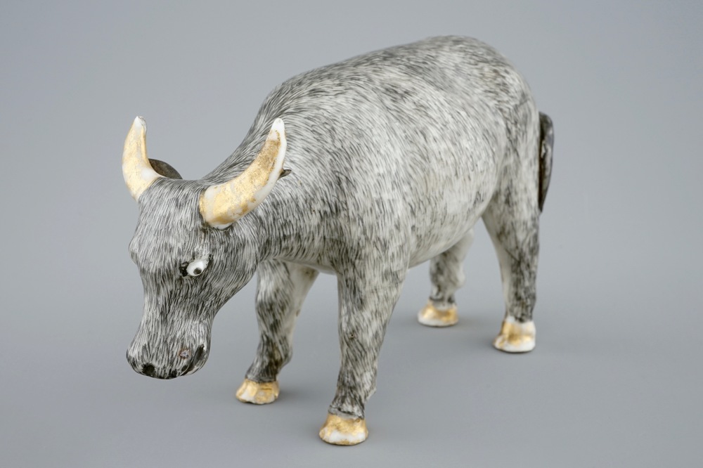 An unusual Chinese grisaille and gilt model of an ox, Qianlong, 18th C.