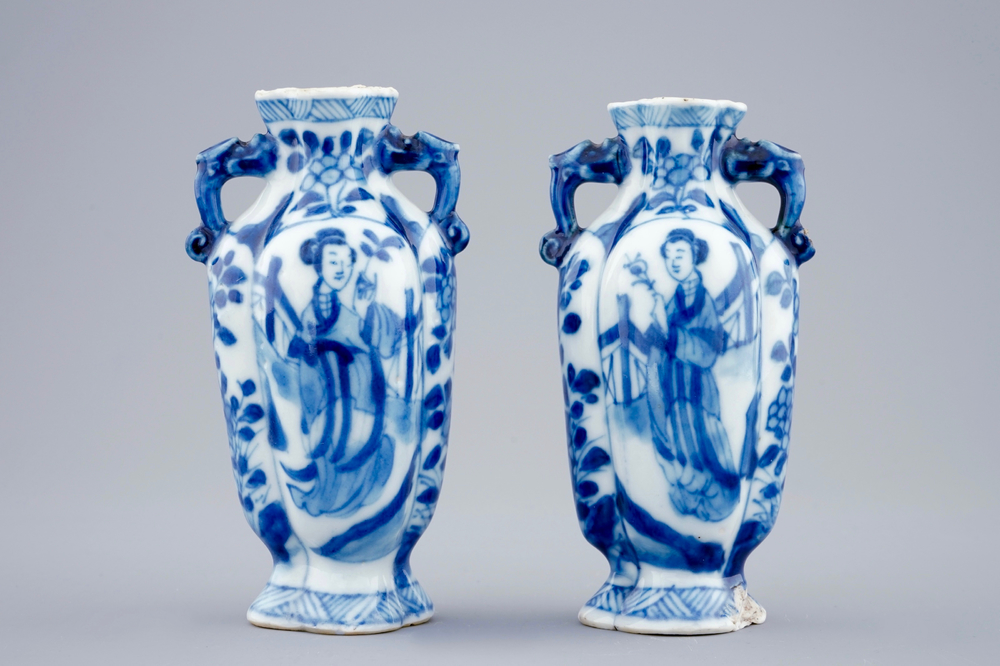 A pair of small Chinese blue and white vases with long Elizas, Kangxi