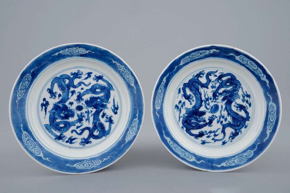 A pair of Chinese blue and white dragon plates, Xuande marks, Kangxi