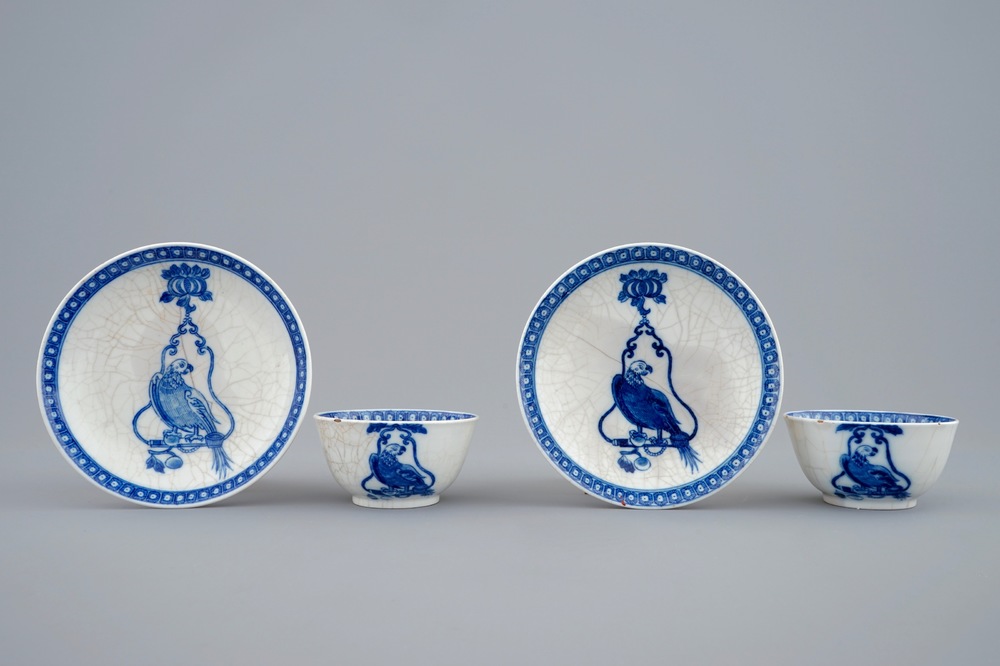 A pair of Chinese blue and white cups and saucers with "The parrot on the perch", Qianlong, 18th C.