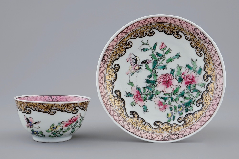 A Chinese famille rose eggshell cup and saucer with butterflies among flowers, Yongzheng, 1723-1735