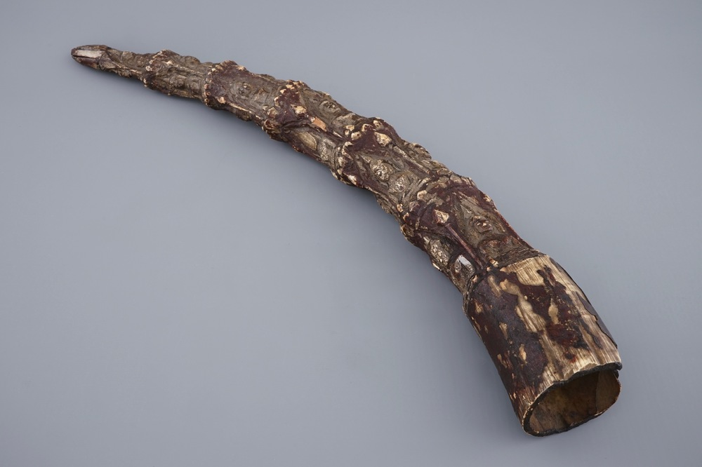 A carved and lacquered ivory tusk with Buddhas, Burma, 17/18th C.