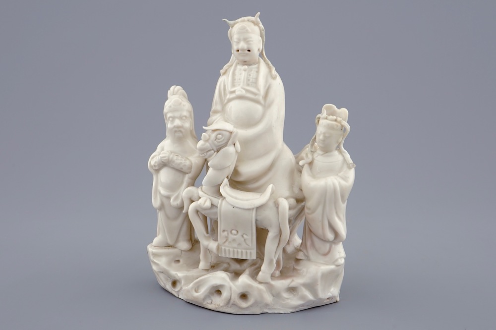 A Chinese Dehua blanc de Chine group of Wen Chang with 2 followers, 18/19th C.