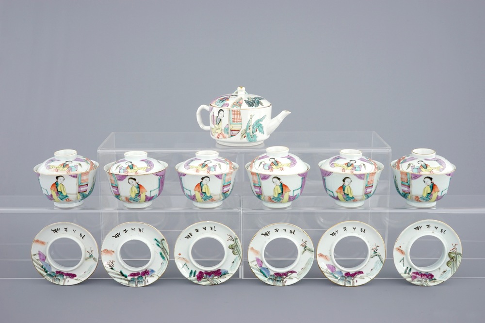 A Chinese qianjiang cai teapot and six matching covered cups on stands, 19/20th C.