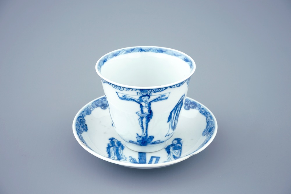 A blue and white Chinese cup and saucer with "The crucifixion", Kangxi