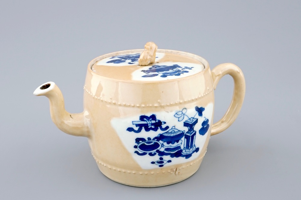 A Chinese blue and white on caf&eacute; au lait ground teapot and cover, Kangxi