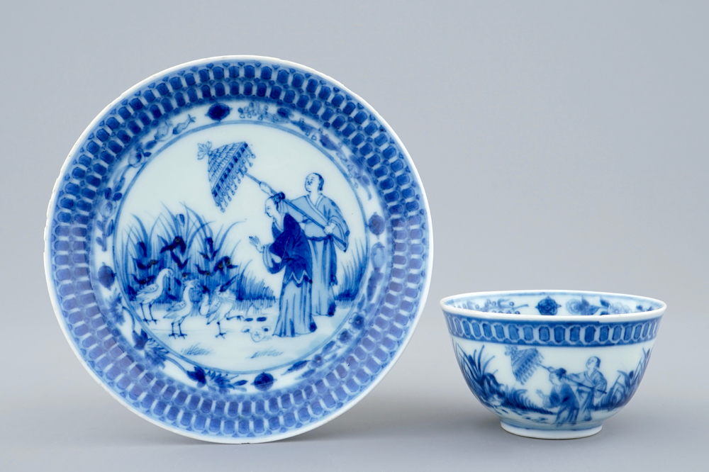 A Chinese blue and white cup and saucer with "La Dame au Parasol" after Pronk, ca. 1740