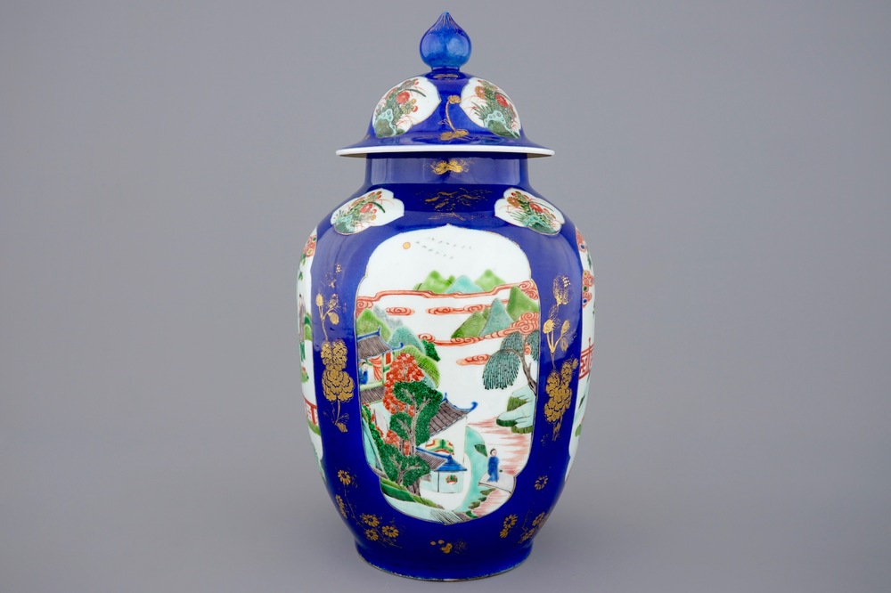 A Chinese famille verte powder blue ground vase and cover, 19th C.