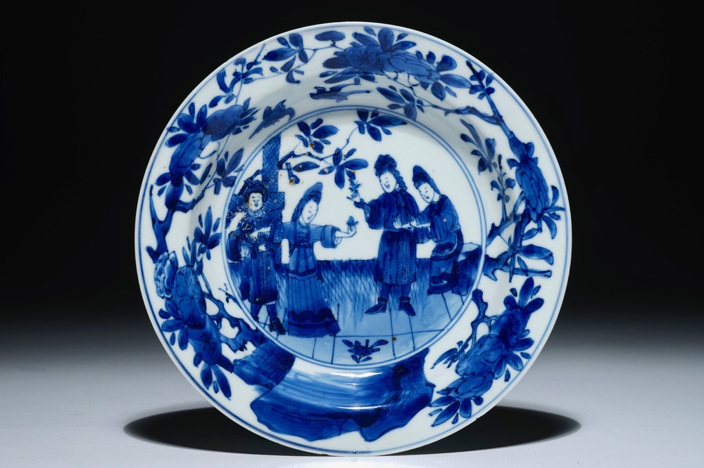 A Chinese blue and white plate depicting the sense of smell, Kangxi