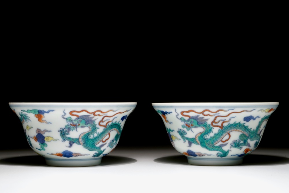 A pair of Chinese doucai "dragon" bowls, Yongzheng mark, 20th C.