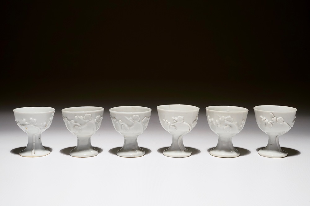 Six Chinese blanc de Chine stem cups with applied floral sprigs, 18/19th C.