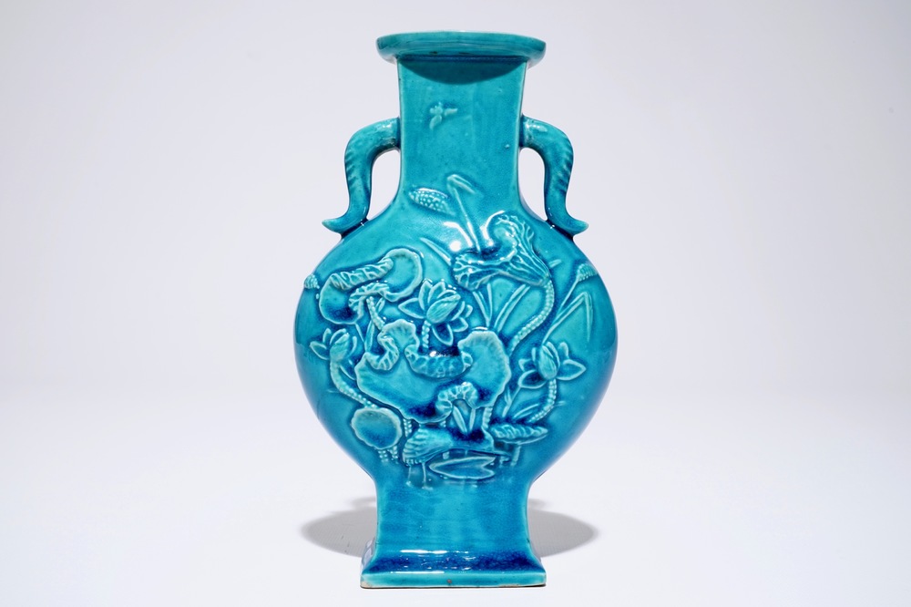 A Chinese turquoise relief-decorated moonflask with relief design, 19th C.