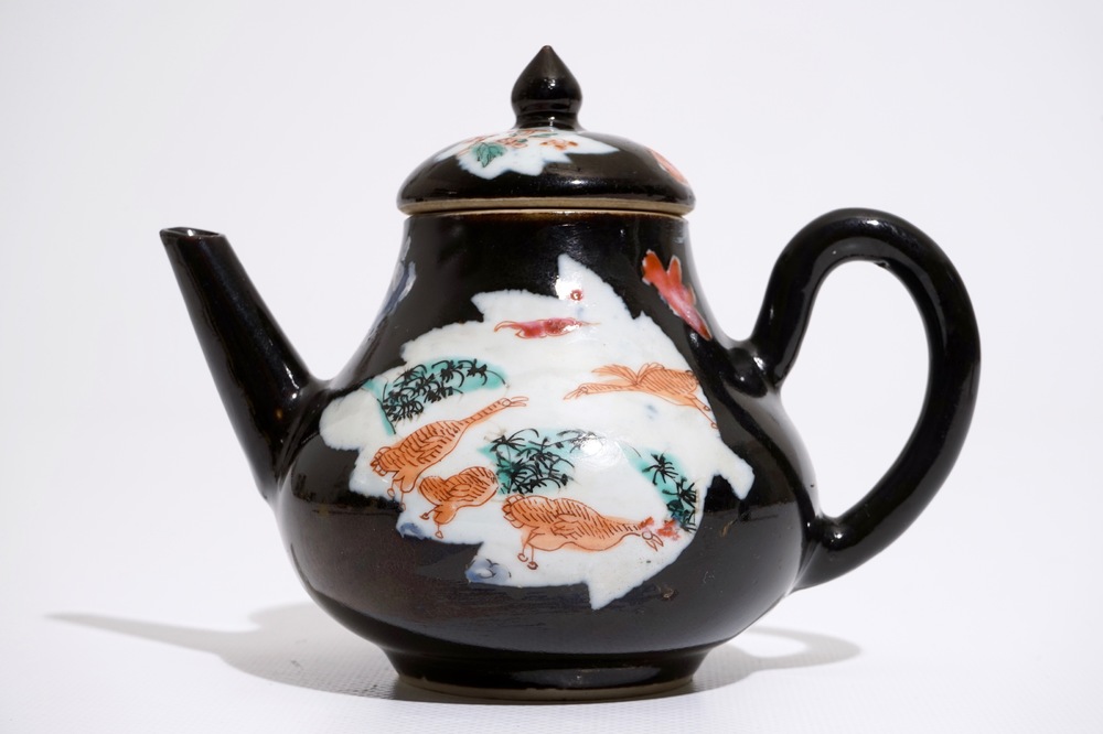 A Chinese black ground famille rose teapot and cover with geese, Yongzheng/Qianlong
