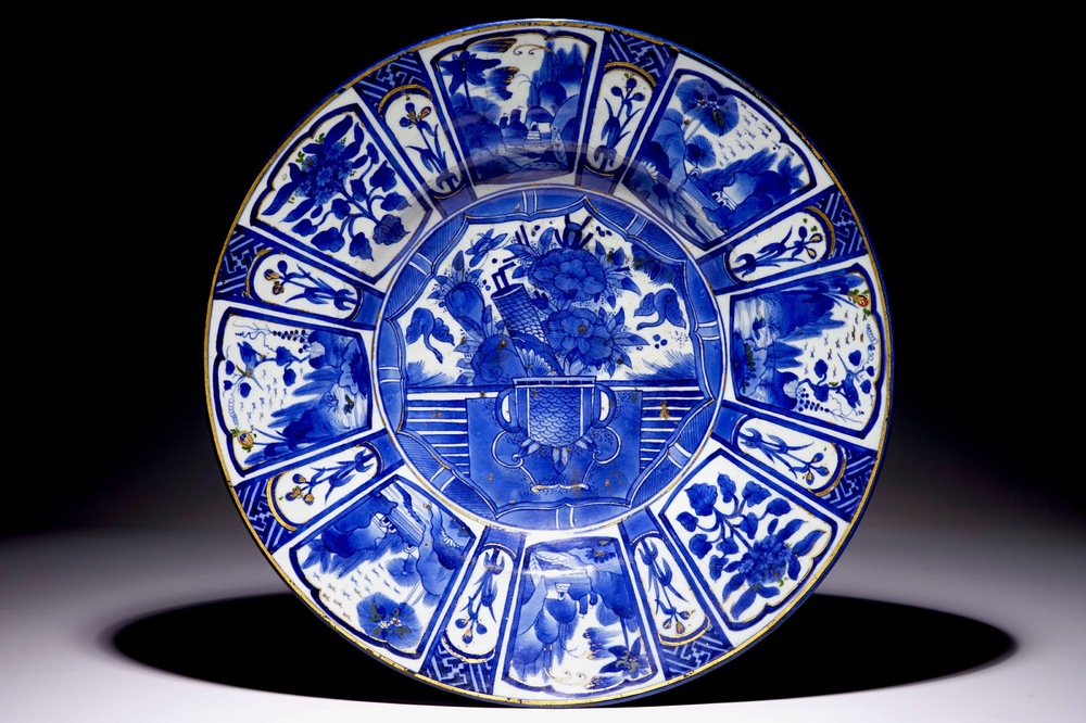 A large over-decorated Japanse Arita Wanli-style charger, ca. 1700