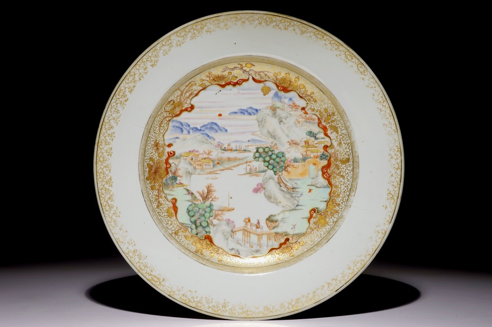 A large Chinese famille rose and gilt dish with a fine landscape, Yongzheng/Qianlong