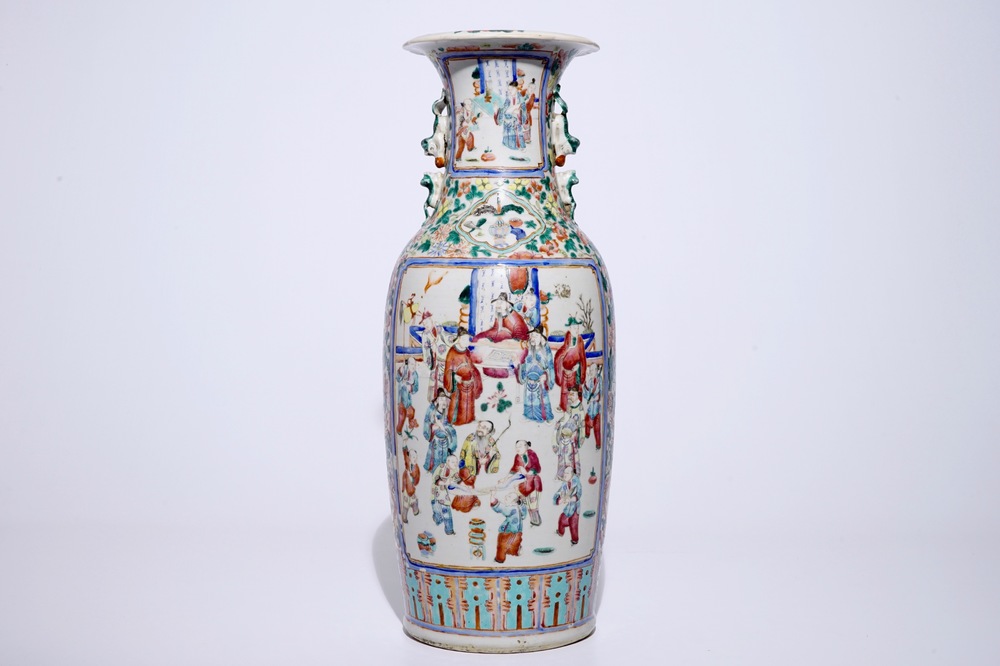 A tall Chinese famille rose vase with a garden scene, 19th C.
