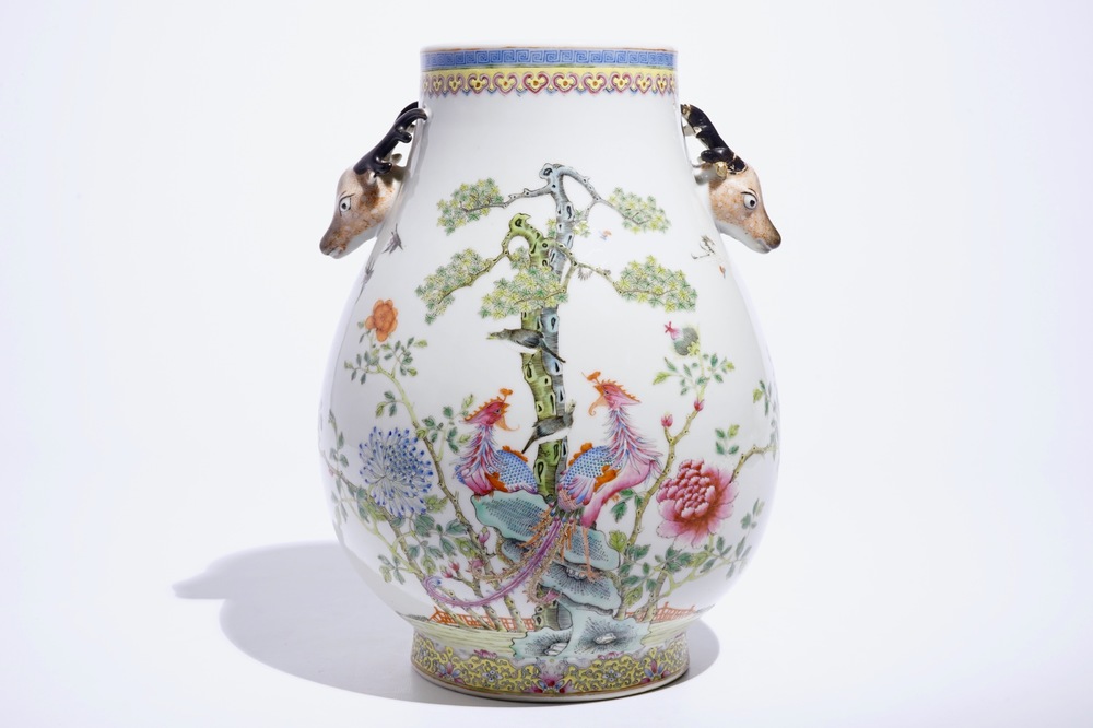 A Chinese famille rose hu vase with phoenixes and deer head handles, Qianlong mark, 19/20th C.