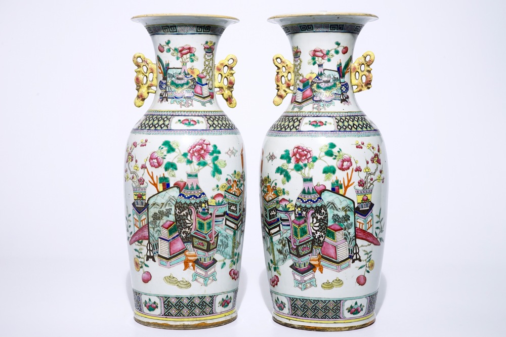 A pair of Chinese famille rose vases with "100 antiquities" design, 19th C.