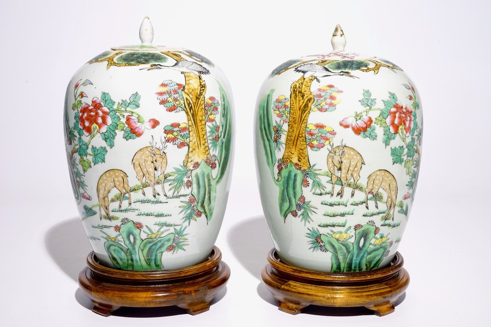 A pair of Chinese famille rose covered jars with cranes and deers, 19/20th C.