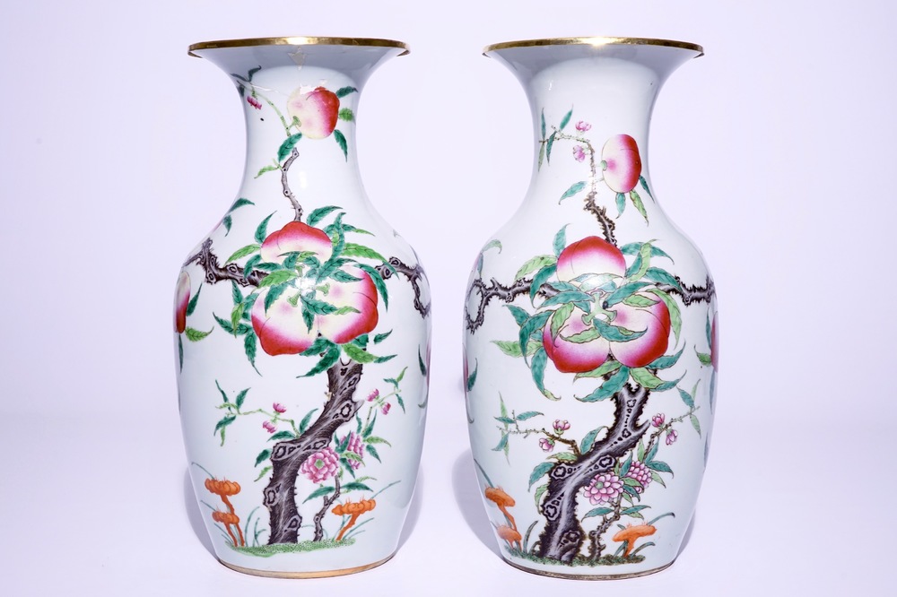 A pair of Chinese famille rose "nine peaches" vases, 19th C.
