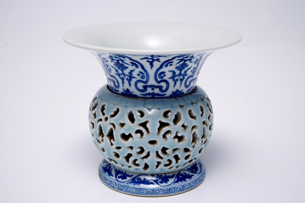 A rare blue, white and lavender-glazed reticulated revolving zhadou spittoon, Qianlong mark, 19/20th C.
