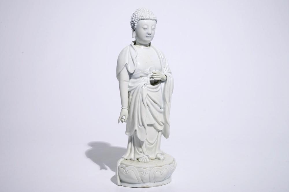 A Chinese Dehua blanc de Chine model of a standing Buddha, impressed mark on the back, Kangxi
