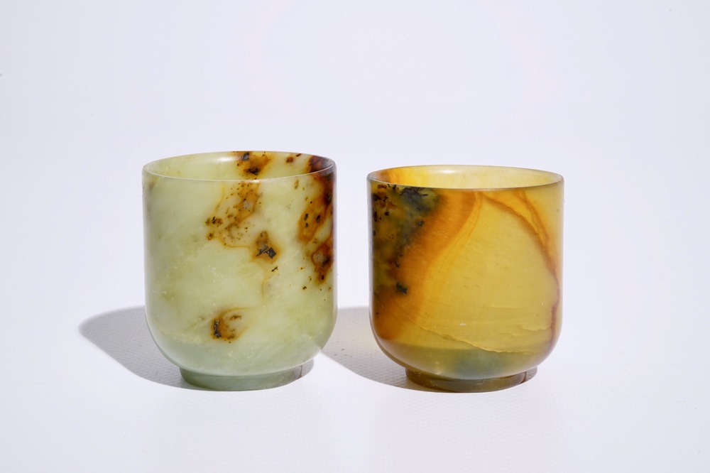 Two Chinese mottled jade wine cups, 20th C.