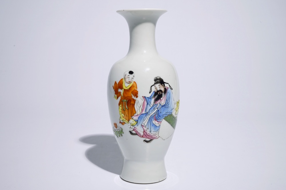 A Chinese famille rose vase with a sage and a boy, Hongxian mark, 20th C.