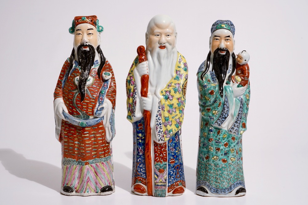 A set of three Chinese famille rose figures of immortals, 19/20th C.