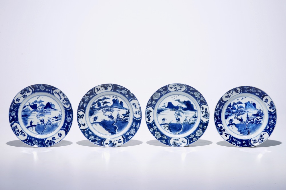 Four Chinese blue and white landscape plates, Kangxi