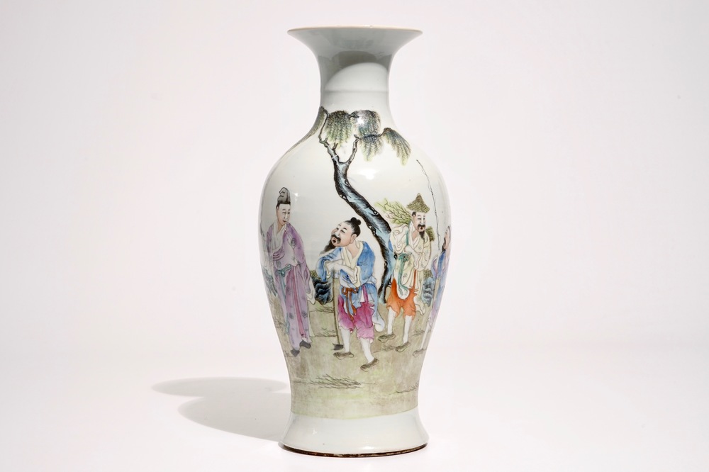 A Chinese famille rose baluster vase, red sealmark, Republic, 20th C.