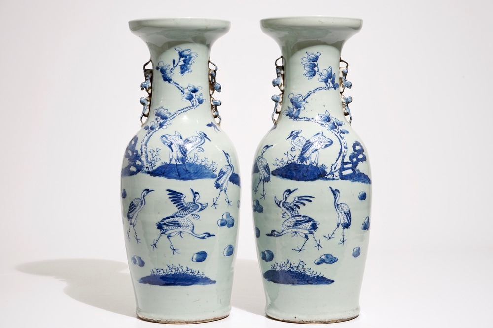 A pair of Chinese vases in blue and white on celadon ground with cranes, 19th C.