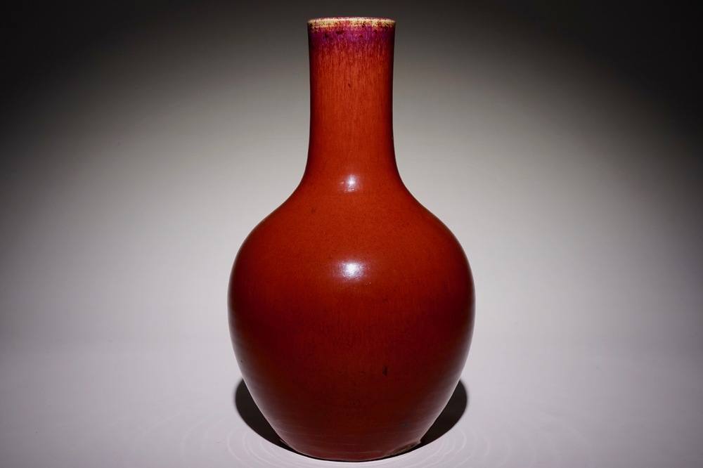 A Chinese monochrome sang-de-boeuf-glazed tianqiu ping bottle vase, 19th C.