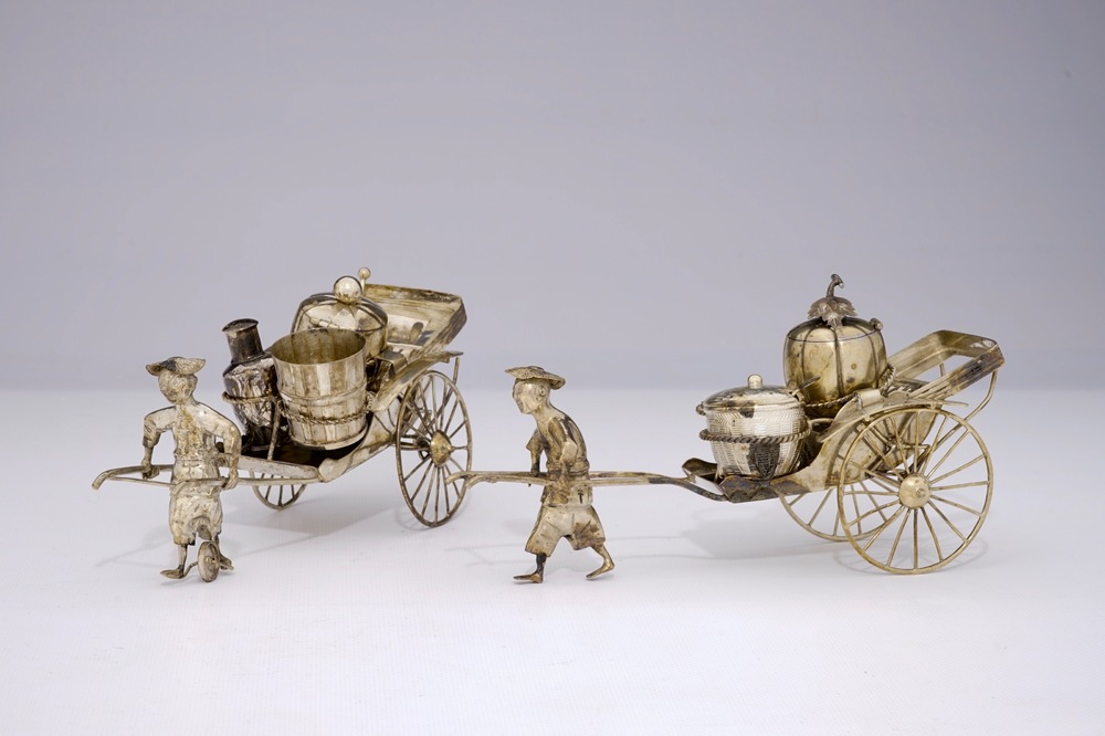 A pair of Chinese silver rickshaw-shaped pepper and salt shakers with a mustard container, 19th C.