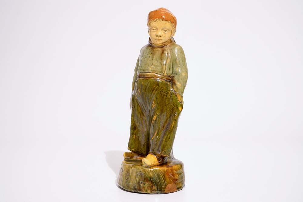 A Flemish pottery figure, "The little farmer", prob. Laigneil workshop, 20th C.