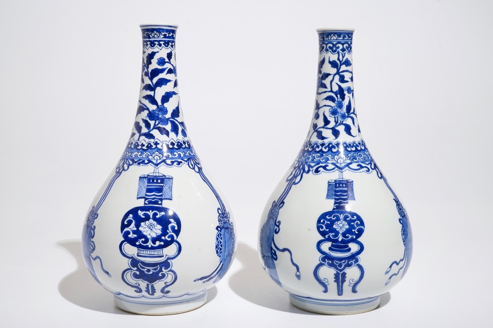 A pair of Chinese blue and white bottle vases, Kangxi