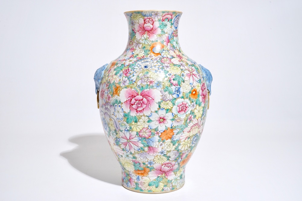 A Chinese famille rose millefleurs hu vase, Qianlong mark, 19/20th C.