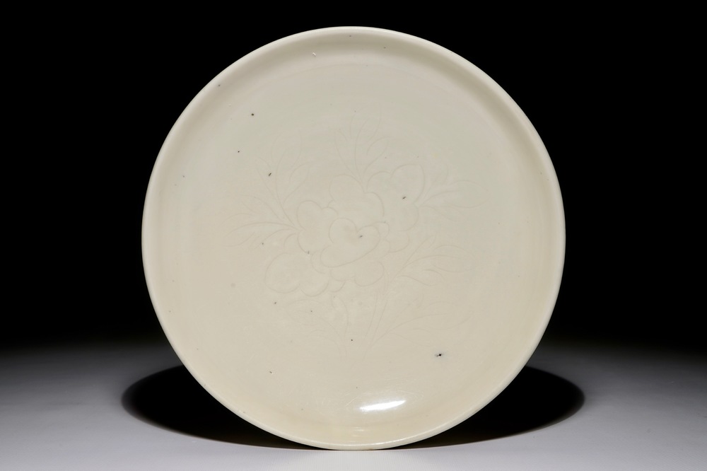 A Chinese Dehua blanc de Chine dish with incised floral design, Kangxi