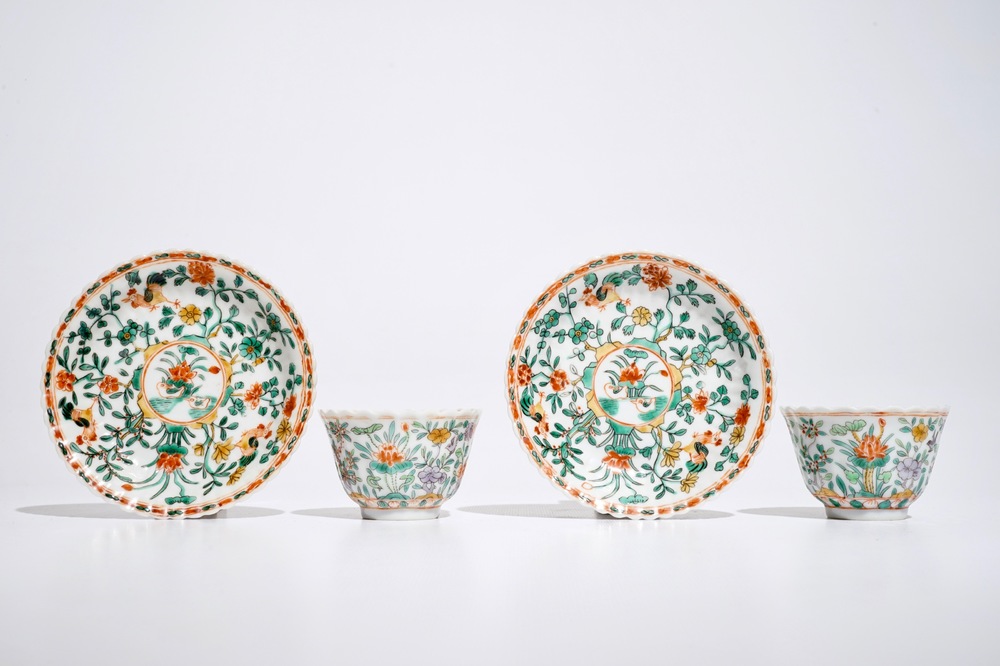 A pair of Chinese famille verte cups and saucers, Kangxi