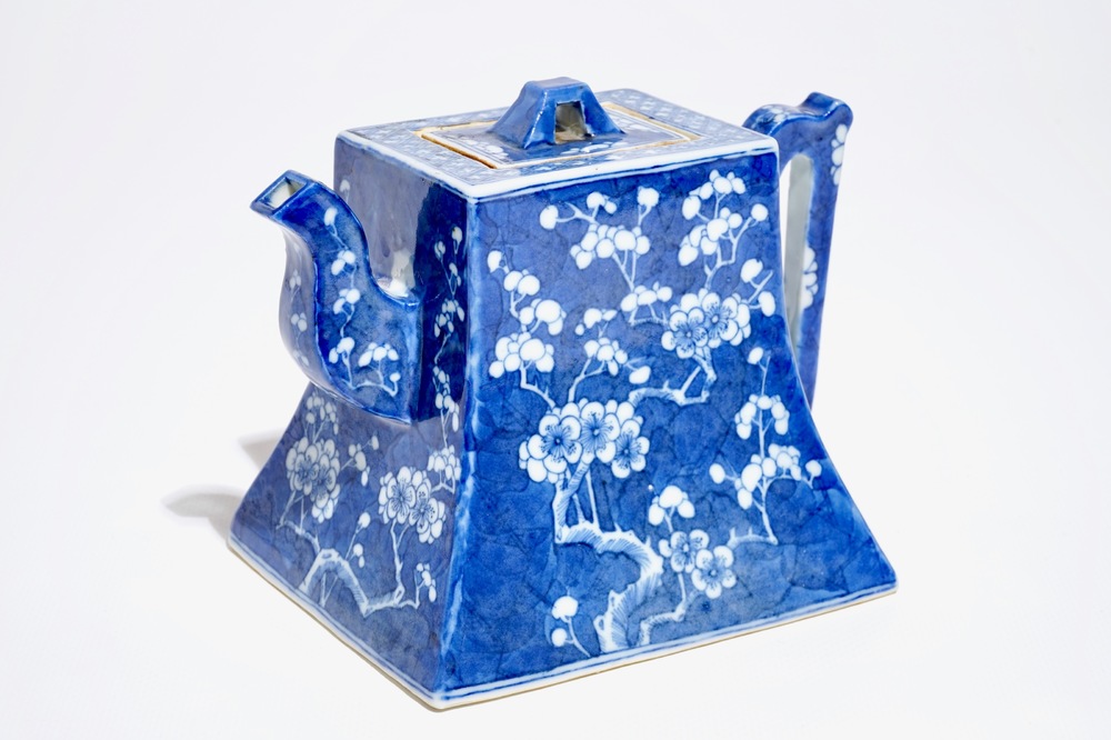 A Chinese blue and white "prunus and ice" teapot and cover, Kangxi mark, 19th C.