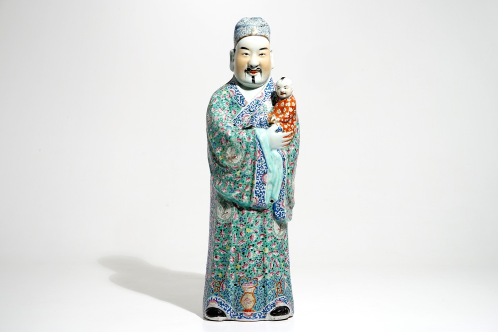 A tall Chinese famille rose figure of an immortal, 19th C.