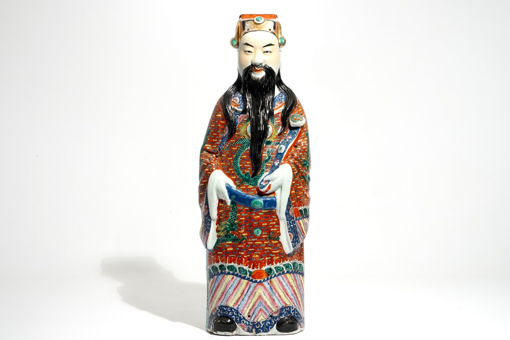 A tall Chinese famille rose figure of an immortal, 19th C.