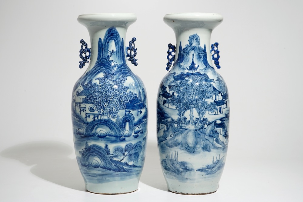 Two tall Chinese blue and white landscape vases, 19/20th C.
