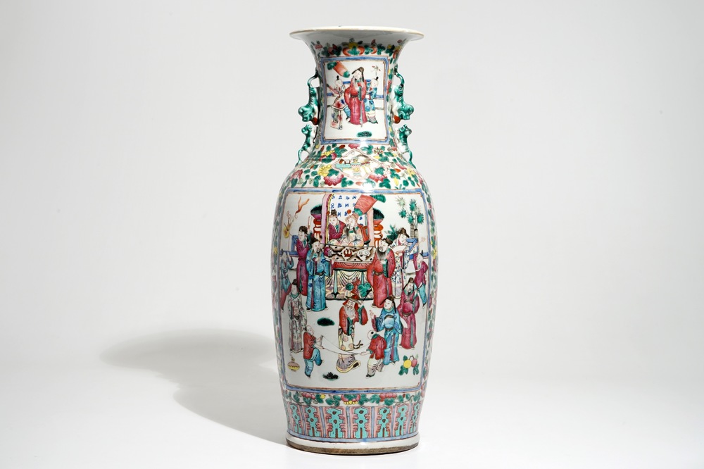 A tall Chinese famille rose vase with a court scene, 19th C.