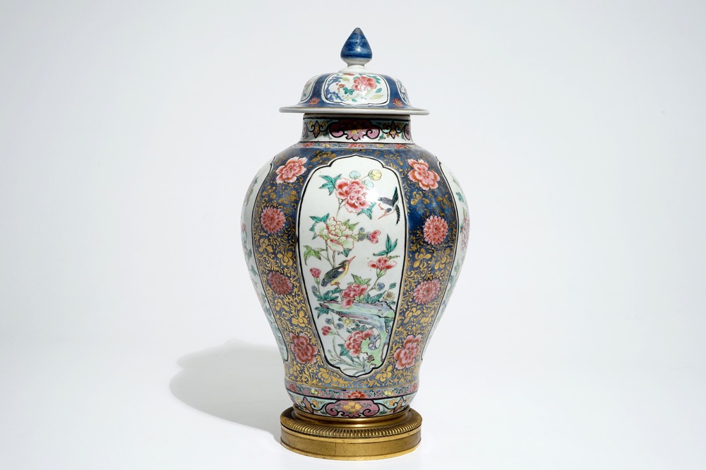 A Chinese bronze-mounted famille rose on blue-ground baluster vase and cover, Yongzheng