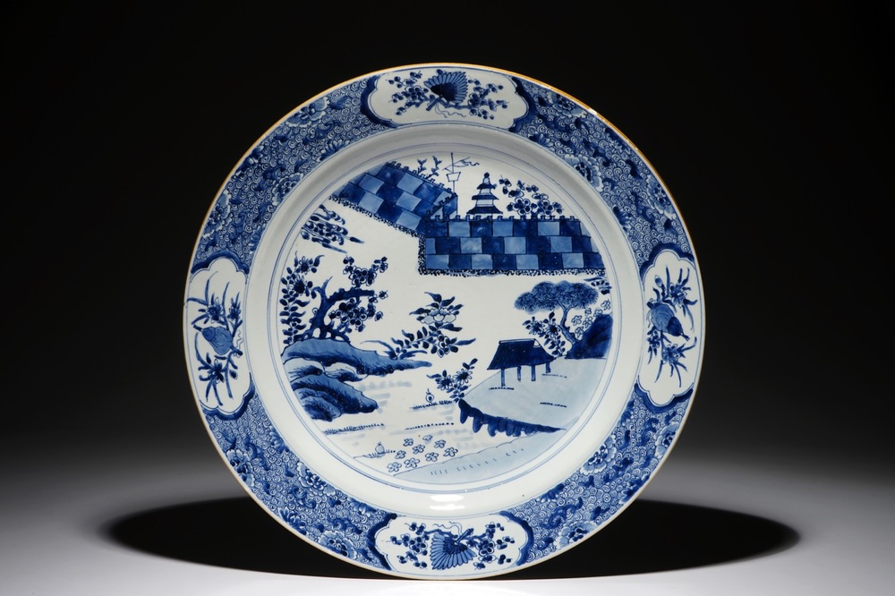 A very large Chinese blue and white charger with the Chinese wall, Kangxi