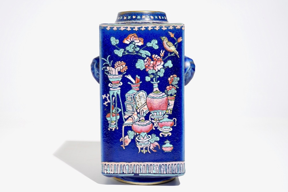 A Chinese famille rose enamelled blue-ground cong vase, 19th C.