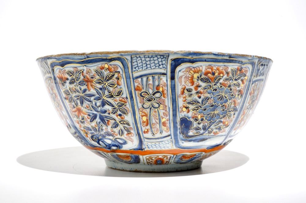 A Chinese clobbered blue and white kraak porcelain bowl with floral design, Wanli