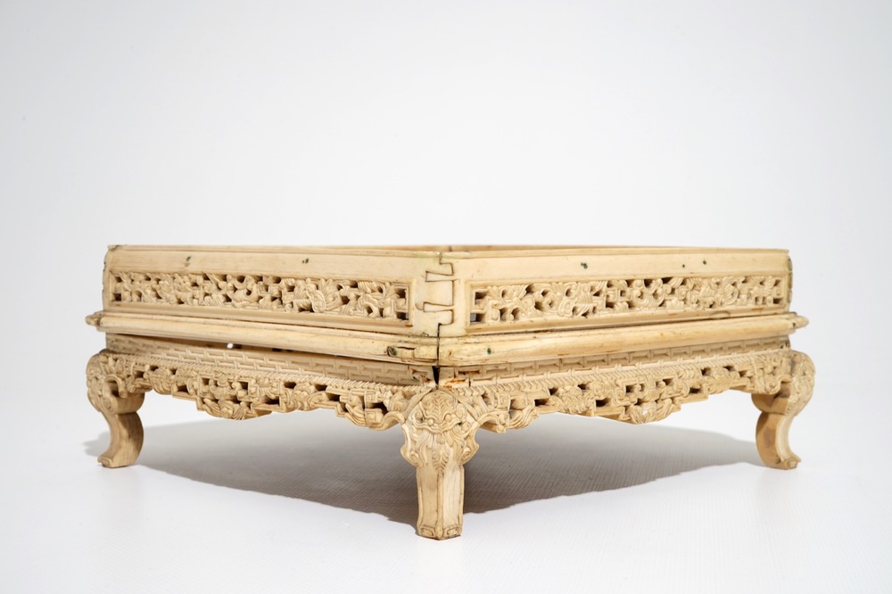 A large Chinese carved ivory stand, 18/19th C.